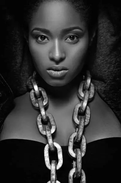 Photo of Black and white studio shot of beautiful female model