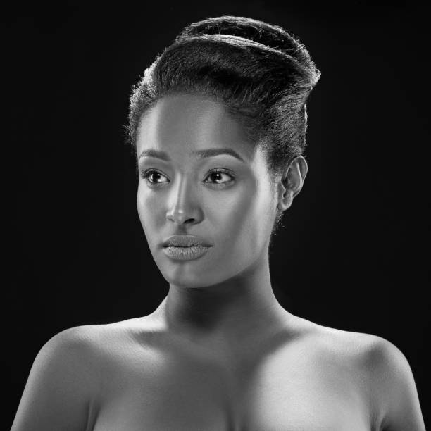 istock Black and white studio shot of beautiful female model 843314572