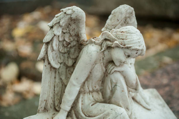 istock stoned angel in cemetery 843314628
