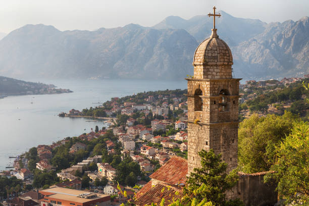 Kotor Cityscape and Church of Our Lady of Remedy Kotor is an old town in Montenegro. The Church of Our Lady of Remedy is a Roman Catholic church, belonging to the Roman Catholic Diocese of Kotor. The church is perched on the slope of the St. John Mountain. The Church of Our Lady of Remedy dates from 1518. historic district stock pictures, royalty-free photos & images