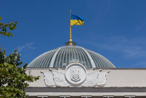 Ukrainian flag waving over Parliament in Kiev stock photo
