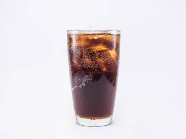 istock soft drink is cool with ice cubes in full glass on whtie background 843326090