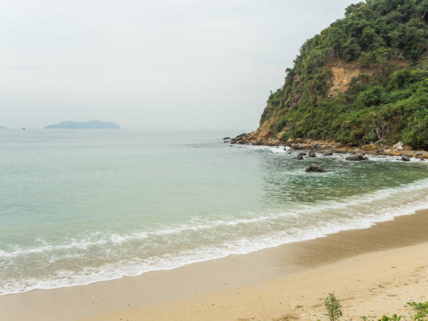 istock Tropical sand beach with sea and mountain 843326106