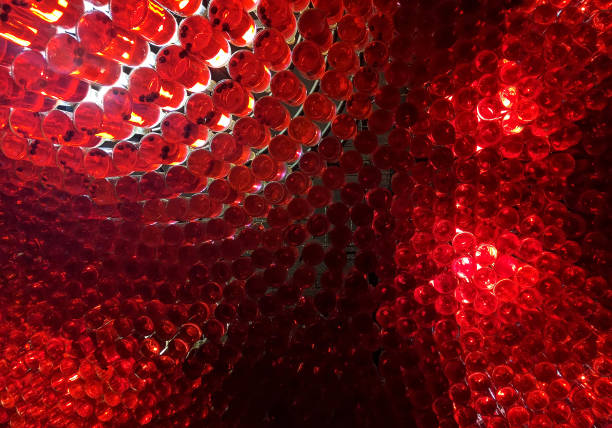 istock Red abstract background from a bottle filled with wine 843326238