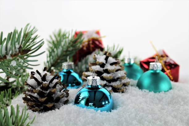 istock An Image of Christmas decoration with balls, snow and tree 843329790