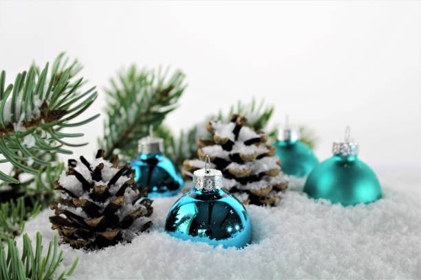 istock An Image of Christmas decoration with balls, snow and tree 843329922