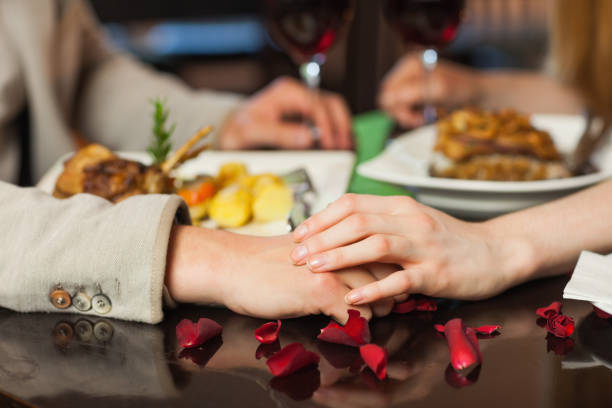istock Close up on loving couple holding hands 843338864