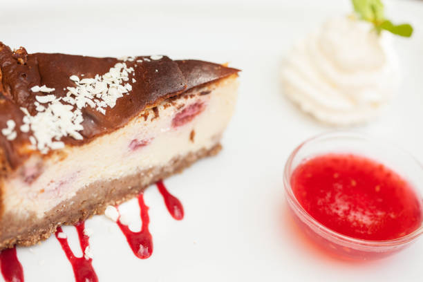 istock Cheesecake with chantilly cream and coulis close up 843342260