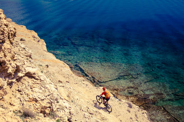 istock Mountain biking at the seaside bike trail 843345766