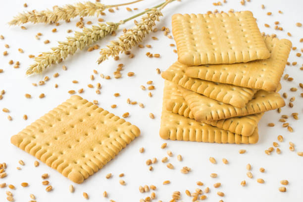 istock Square Cookies, spikes of wheat on a white background 843346500