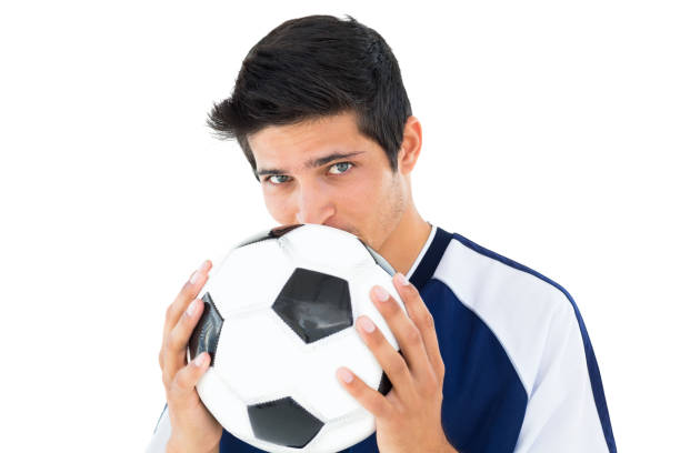 istock Football player in blue holding ball 843348830