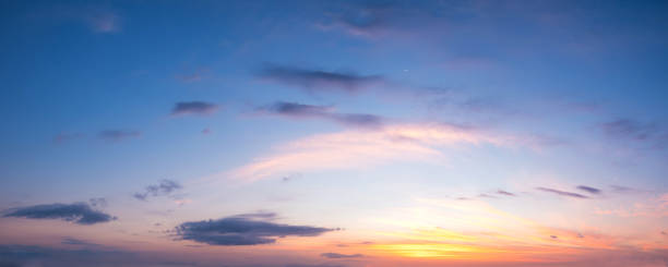istock Vibrant color panoramic sun rise and sun set sky with cloud on a cloudy day. 843350018