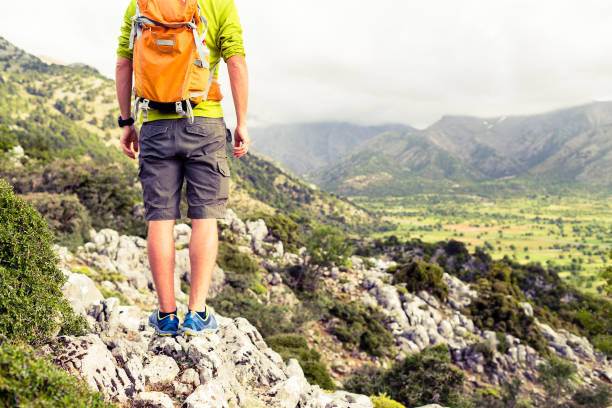 istock Hiking man looking at beautiful mountains 843353344