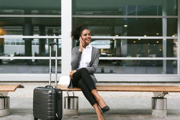 istock Smiling businesswoman sitting on bench 843355598