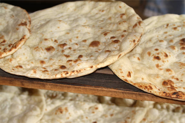 istock Fresh baked tandoori flatbread 843360992