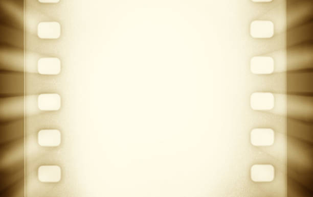 istock Cinema film strip and projector light rays. 843361082