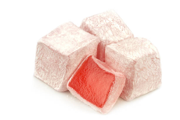 istock Traditional Turkish delight with rose aroma, isolated on white background 843361168