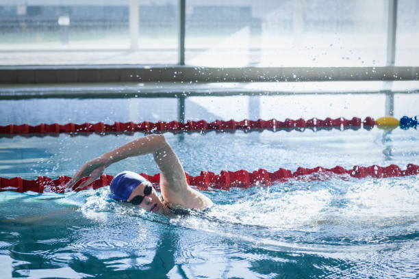 istock Fit woman swimming 843367510