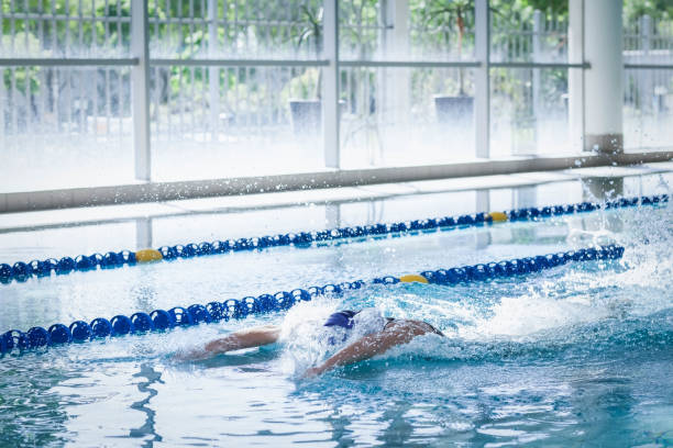 istock Fit woman swimming 843367528