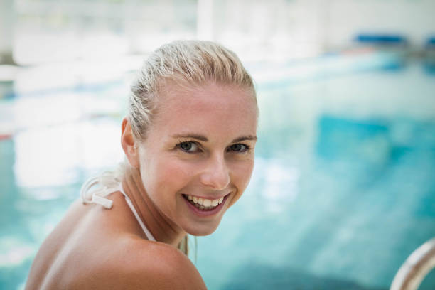 istock Attractive woman getting in the water 843368282