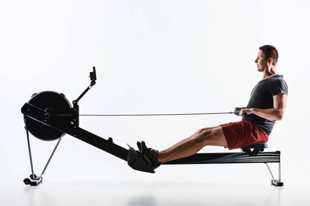 istock Man Using A Press Machine In A Fitness Club 843371194
