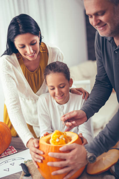 istock Family are celebrating Halloween. 843371470