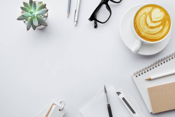 istock Business table top with mock up office supplies on white 843371502