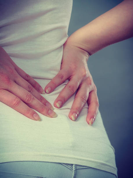 istock Woman suffering from back pain 843372586