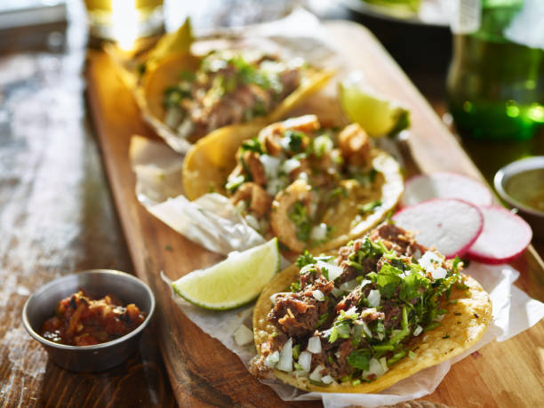 istock authentic mexican street tacos with different meats 843376358