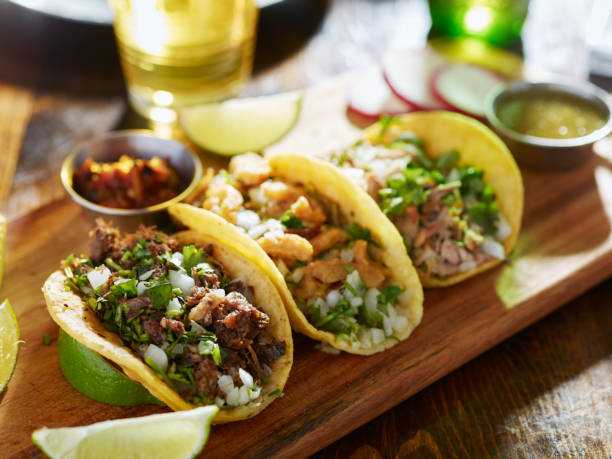 istock three different mexican street tacos with beef and pork 843376488