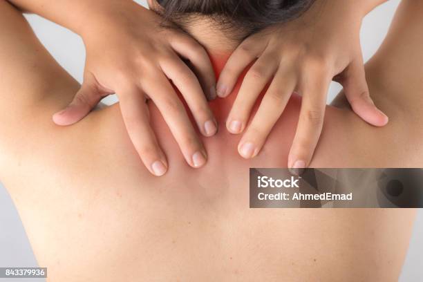 Woman Having Pain At Her Neck And Back Stock Photo - Download Image Now - Adult, Adults Only, Back