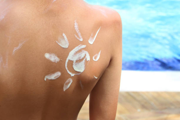 istock Sunscreen lotion over tan skin, sun protection and vacation 843379992