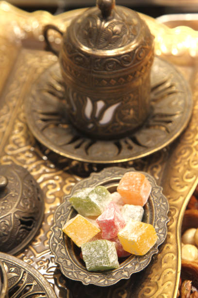 istock Traditional Turkish coffee with silver metal cup and Turkish delight 843380280