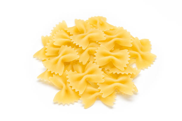 istock Pasta farfalle close-up,  copy space on white background 843386312
