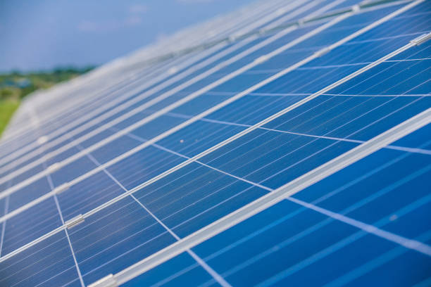 istock Solar panels on the sky background. Solar power plant. Blue solar panels. Alternative source of electricity. Solar farm. 843389944