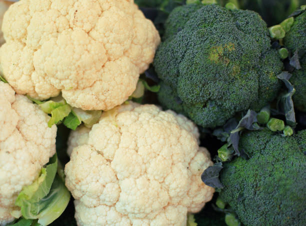 istock Whole broccoli and cauliflower vegetables 843392846