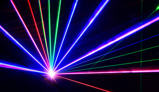 istock Colorful laser lights lines on black 843392968