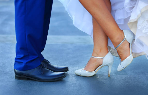 istock Wedding couple walking together hand in hand 843393816