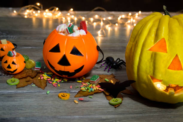istock Halloween pumpkin head jack lantern on wooden background 843397068