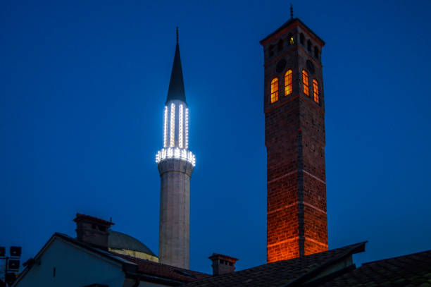 view of the grand mosque of Mardin at dusk. Ulu Mosque minaret is one of the symbolic structures of the city of Mardin, which was established on the summit of the mountain. in the back, the flat plain of Mesopotamia is seen illuminated. Taken at dusk with a full-frame camera.