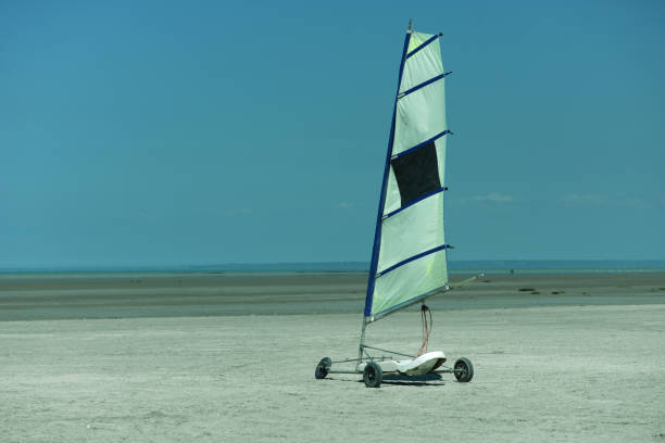 Beach of Puerto de Alcudia in Mallorca with little sailboats and white sand in Majorca