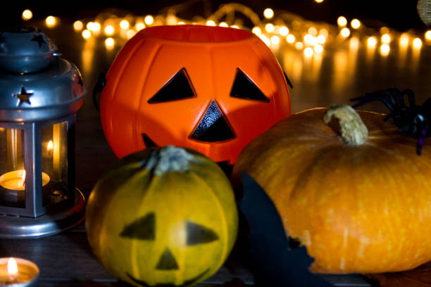 istock Halloween pumpkin head jack lantern on wooden background 843405202