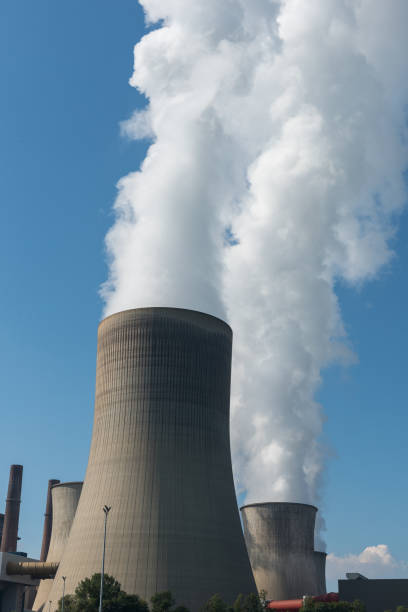 istock Lignite power plant for electricity generation - steam rises from the cooling tower 843407448