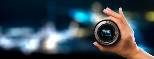 Photography camera lens concept. photography view camera photographer lens lense through video photo digital glass hand blurred focus people concept - stock image image focus technique photos stock pictures, royalty-free photos & images