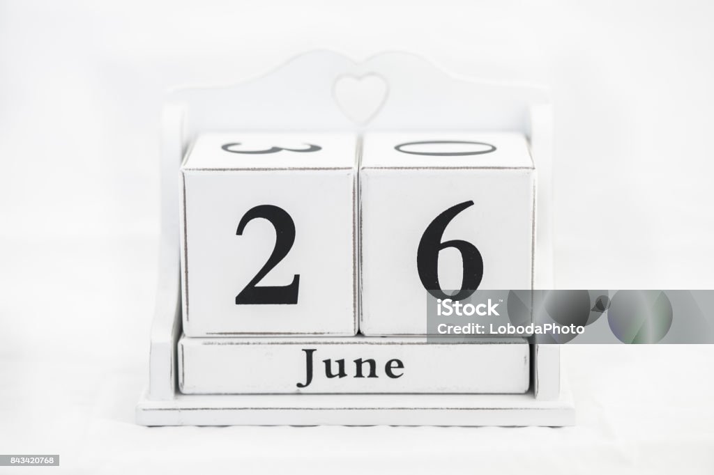 calendar june number calendar june number wood cube Button - Sewing Item Stock Photo