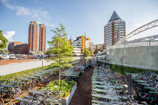 View on the bicycle parking and buildings on the central square in Rotterdam city