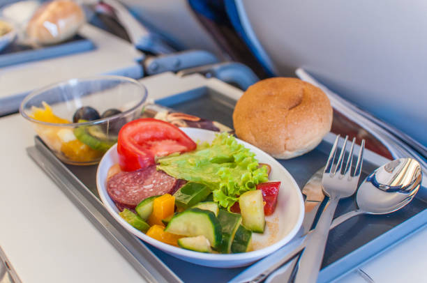 Food on board of an airplane Food on board of an airplane airplane food stock pictures, royalty-free photos & images