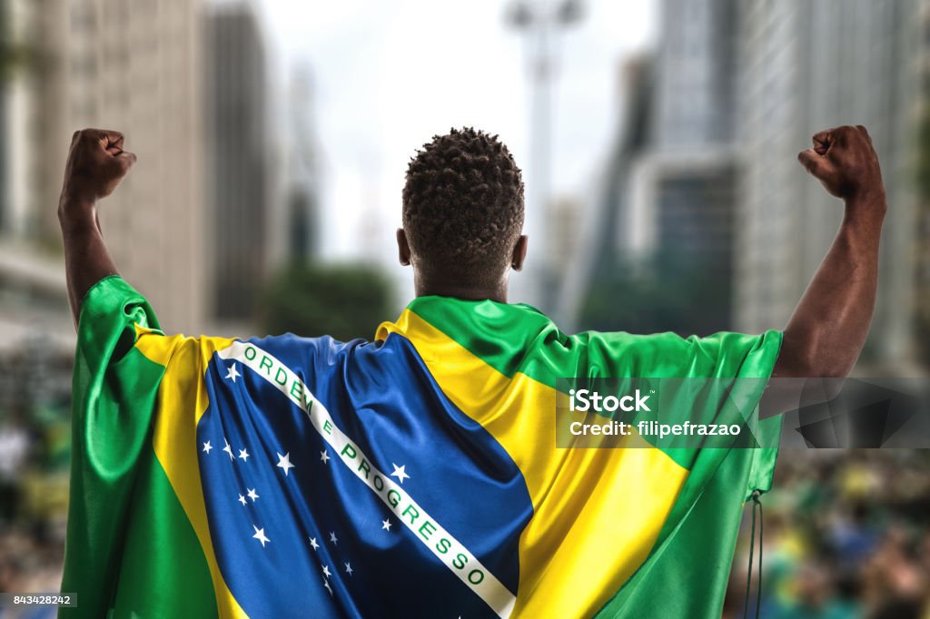 Brazilian young man holding the flag in Sao Paulo People Collection Brazil Stock Photo