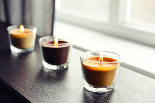 istock Cosy candles on an wooden table 843428464