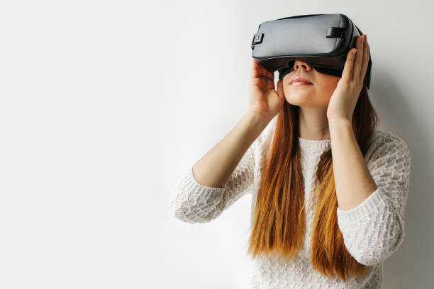 istock Young Woman with glasses of virtual reality. Future technology concept. Modern imaging technology. 843435190